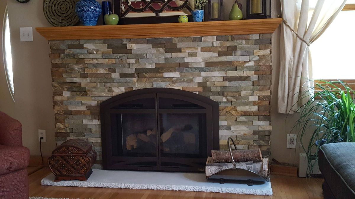 Custom fireplace tile by PhD Home Solutions