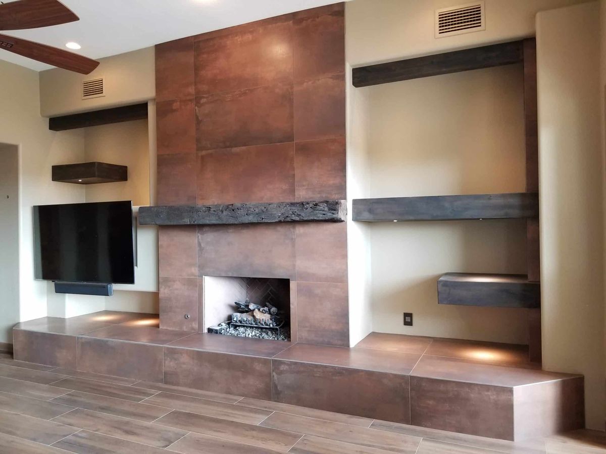 Tile project by PhD Home Solutions — fireplace tile
