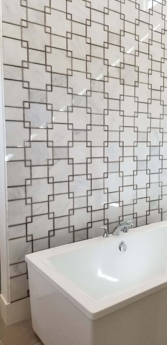 Tile feature wall by PhD Home Solutions