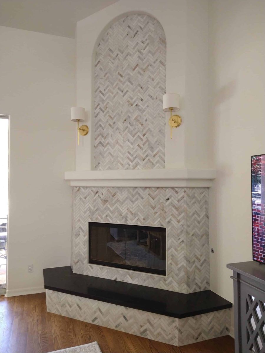 Marble herringbone fireplace surround
