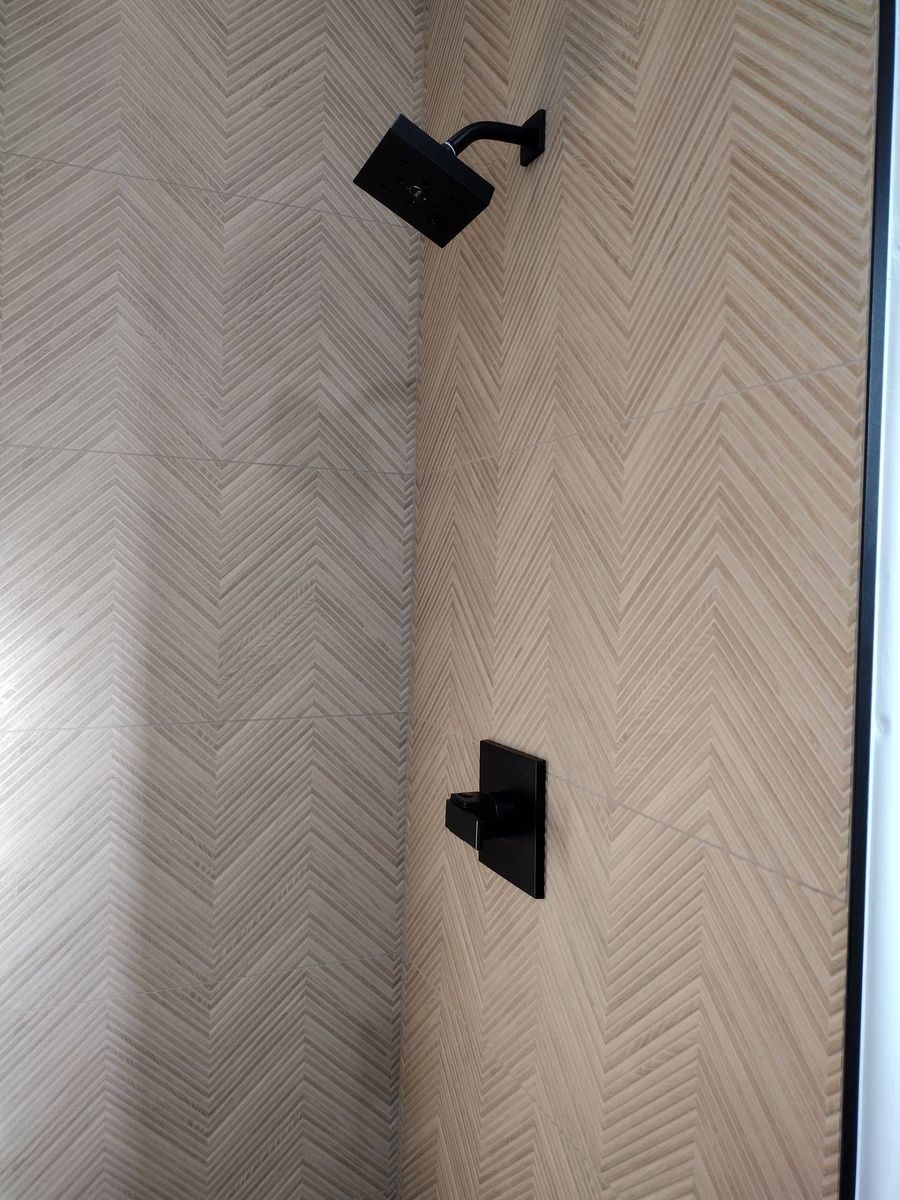 Custom tile shower by PhD Home Solutions